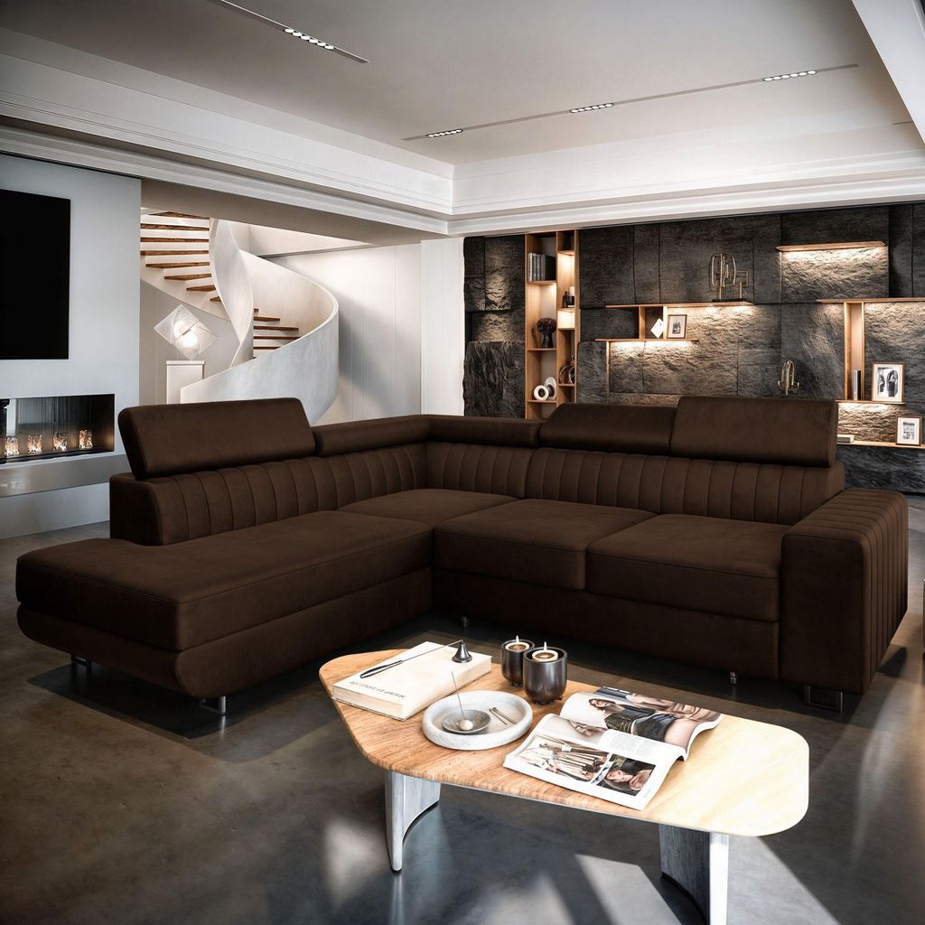 A modern living room with a large sectional sofa, a spiral staircase, and a fireplace.