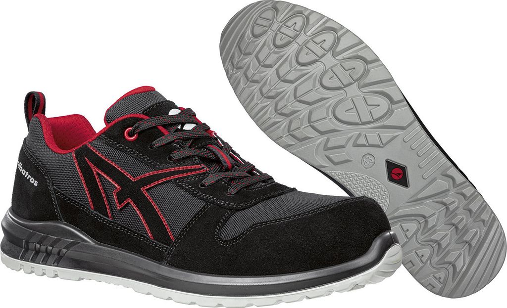 A pair of black and red safety shoes, with one shoe shown from the side and the sole of another shoe shown from the bottom.