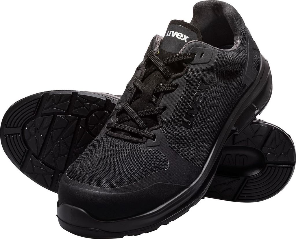 A pair of black safety shoes.