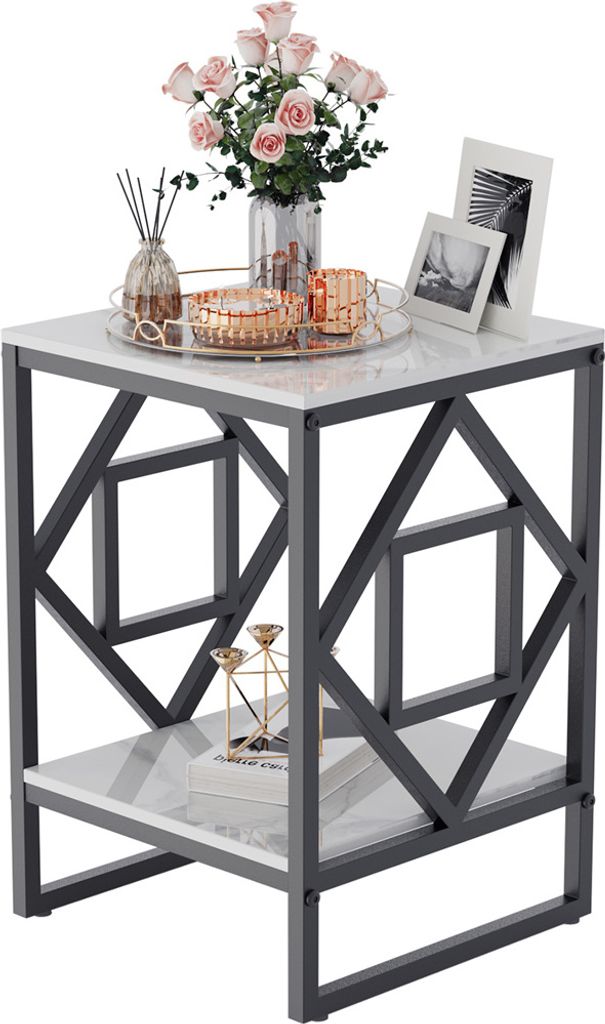 A decorative side table with marble-look top and geometric metal frame, adorned with flowers, candles, and picture frames.