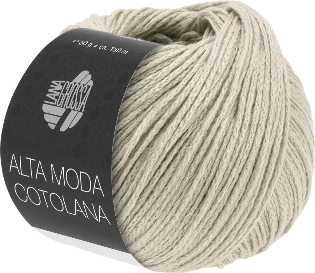 A ball of beige yarn with a dark label wrapped around it.