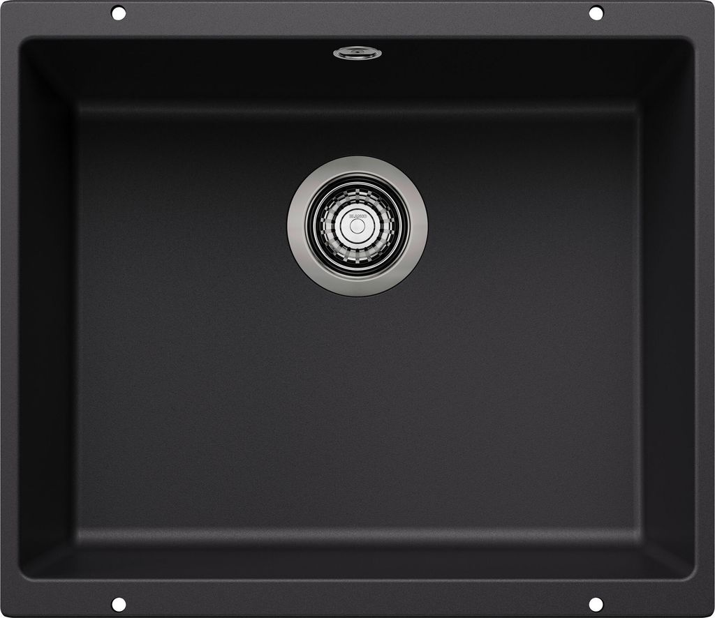 A top-down view of a black kitchen sink with a silver drain.
