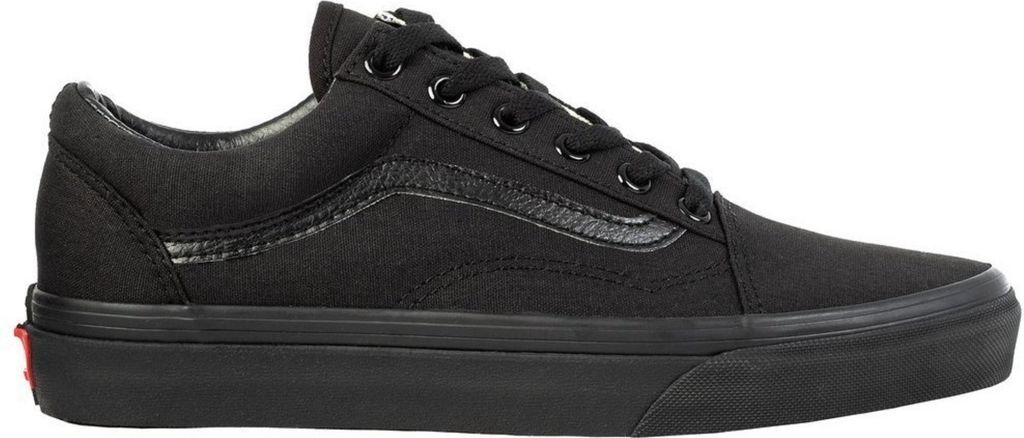 A black Vans sneaker is shown from the side against a white background.