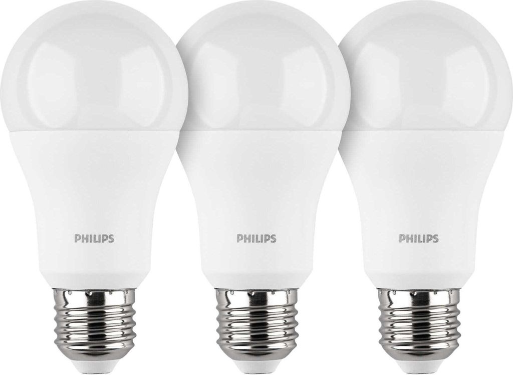 Three Philips LED light bulbs are arranged side-by-side against a white background.
