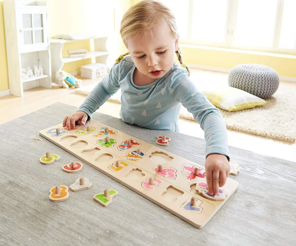 Apprendre les chiffres avec le puzzle de préhension animaux éveil