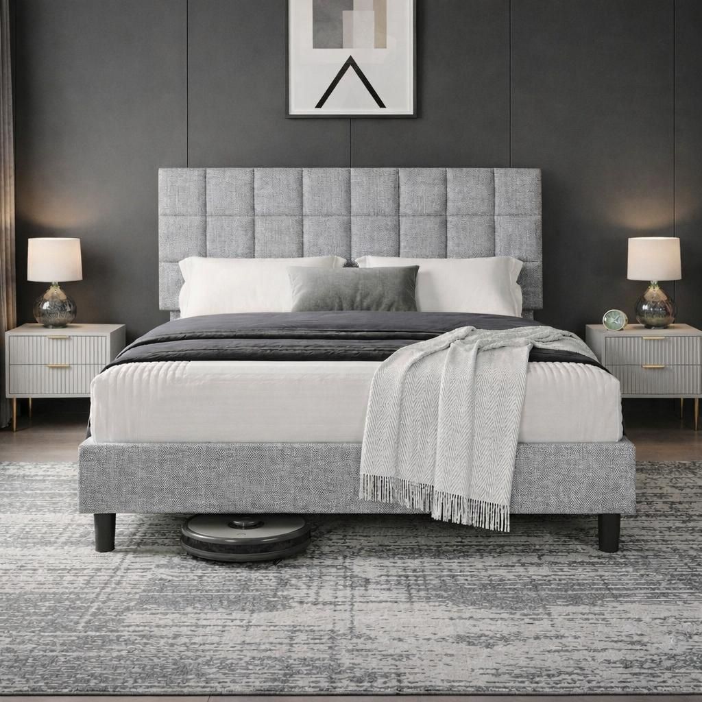 A bedroom scene with a bed, nightstands, and lamps.