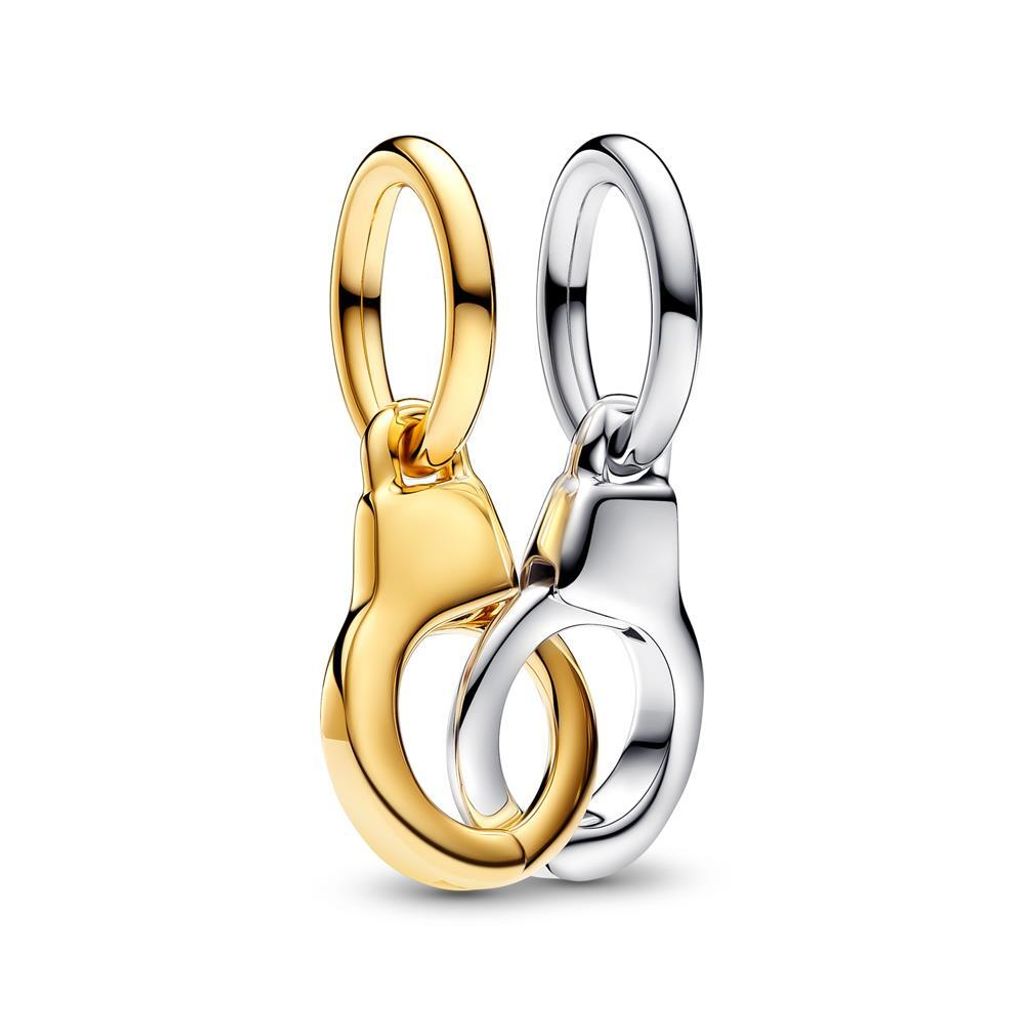 Two charms, one gold and one silver, are interlinked and presented against a white background.