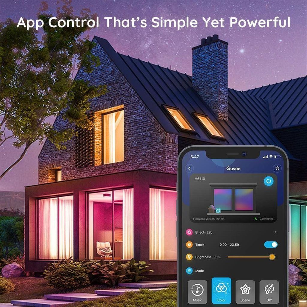 A modern house at night with colorful LED lights illuminating the windows and pathway, controlled by a smartphone app.