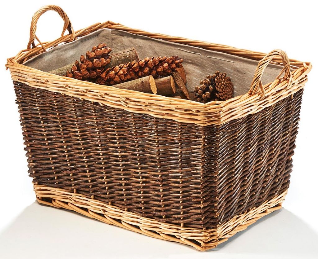 A woven basket filled with pinecones and firewood.