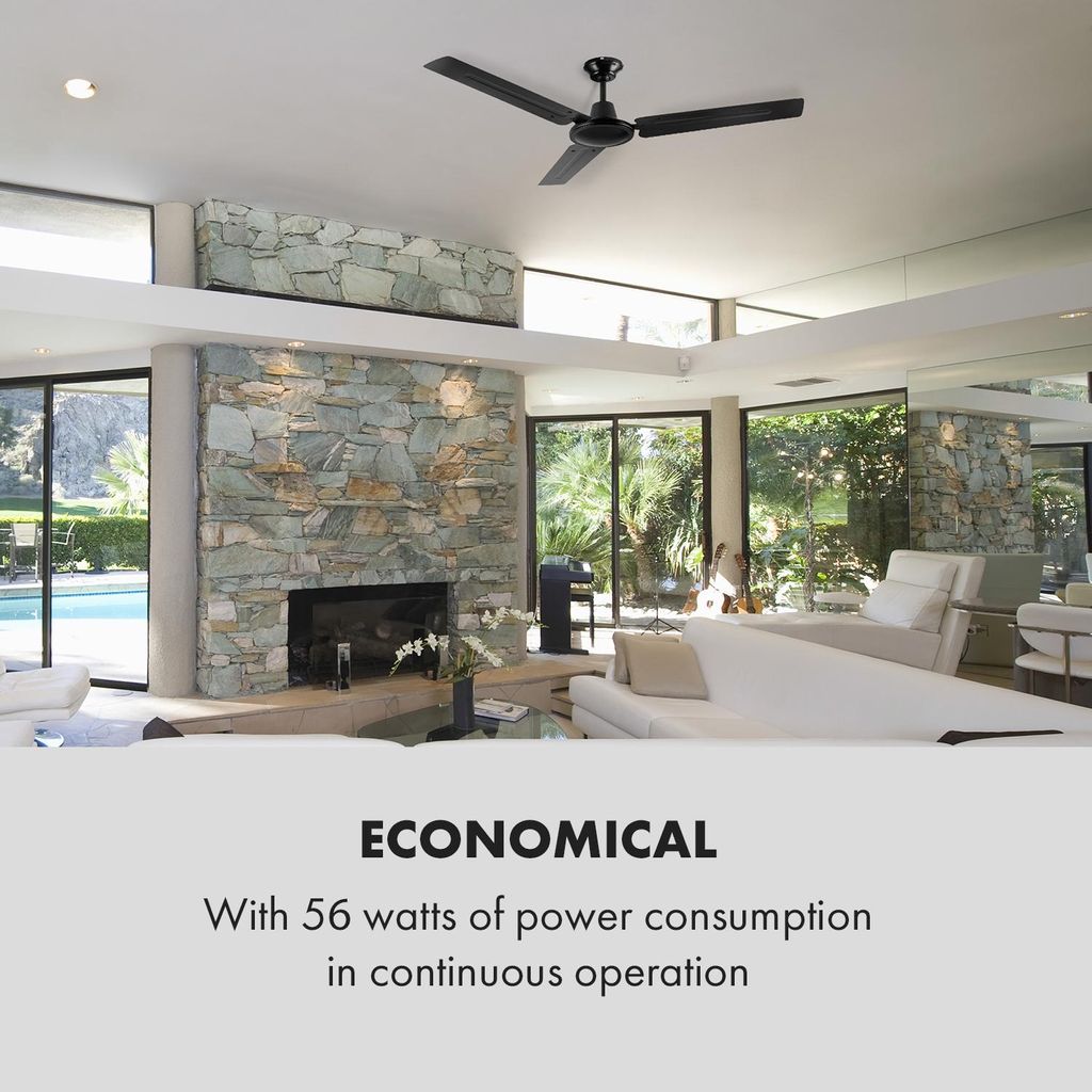 A modern living room with a stone fireplace and a black ceiling fan.