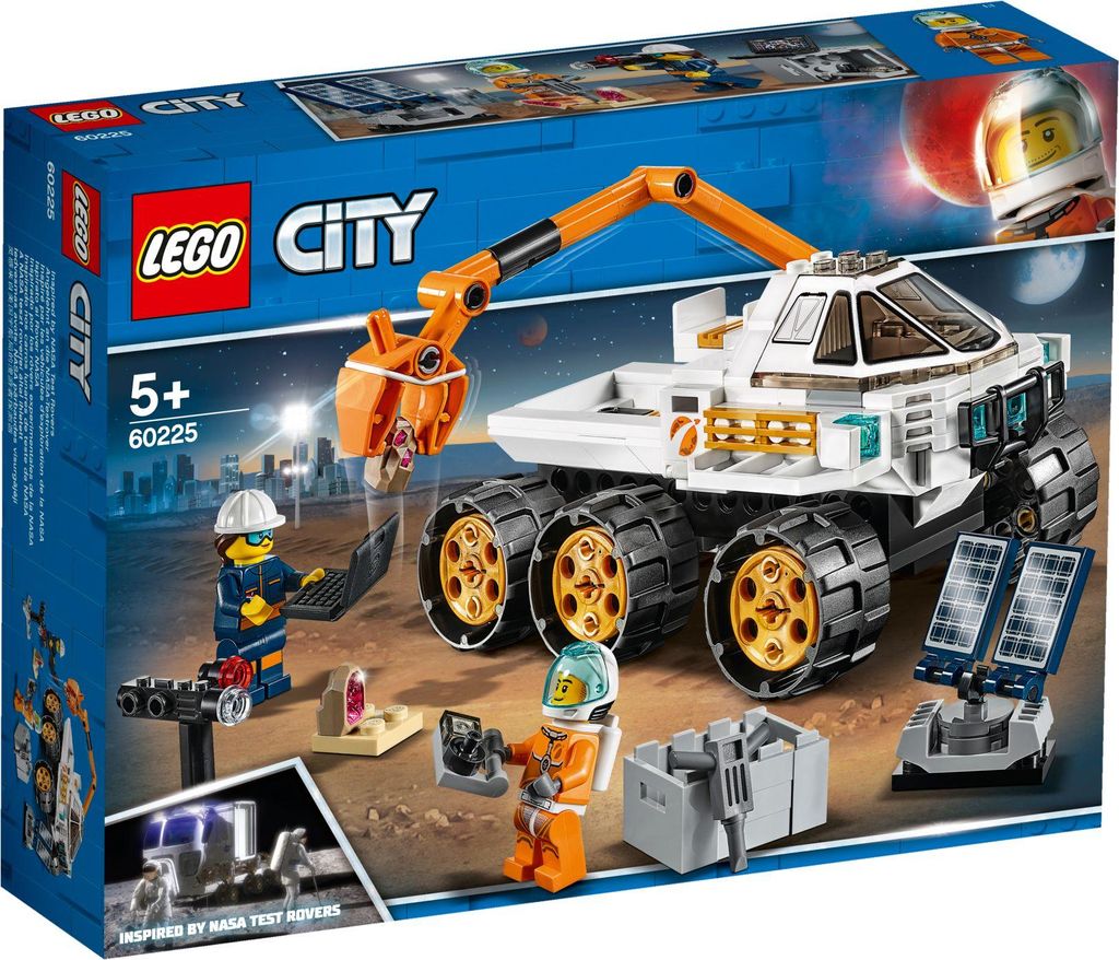 The image shows the packaging of a LEGO City Rover-Testfahrt set, featuring the toy rover and minifigures in a space-themed setting.