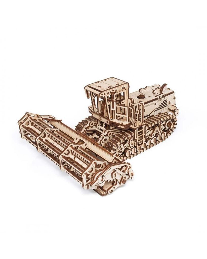 A wooden model of a self-propelled mower.
