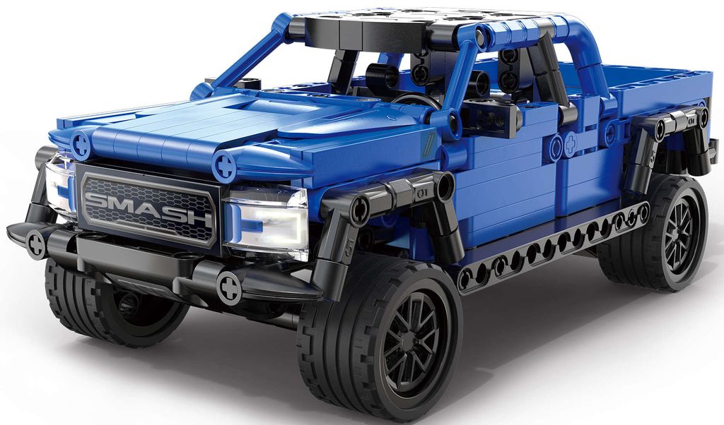 A blue toy truck made of building blocks, shown from a three-quarter front angle on a white background.