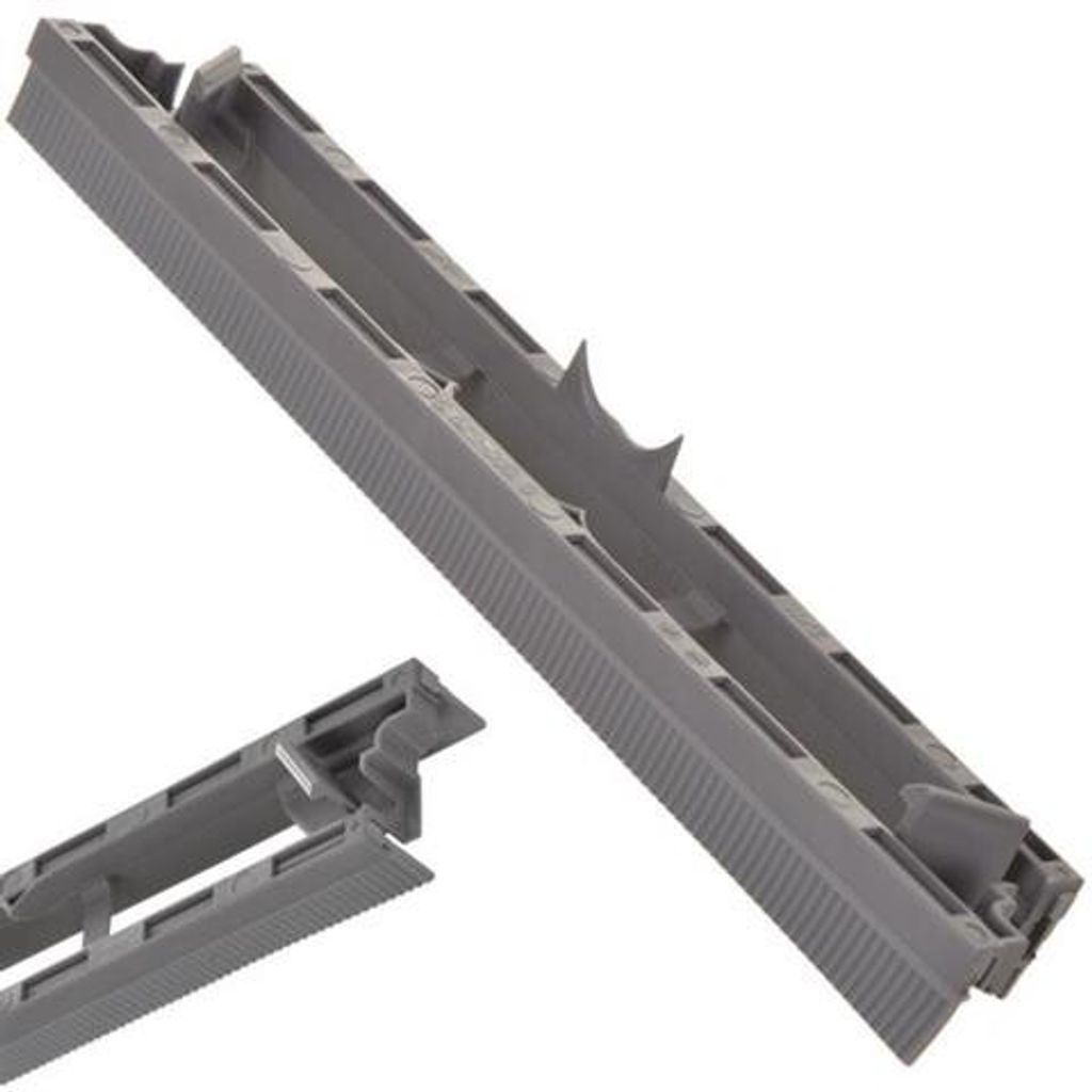 A close-up, angled view of a gray plastic cleaning tool attachment, with a smaller inset view of one end.
