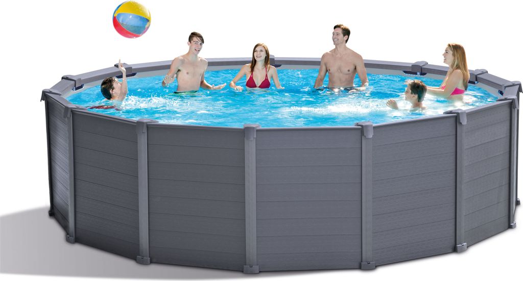 People are enjoying themselves in an above-ground swimming pool.