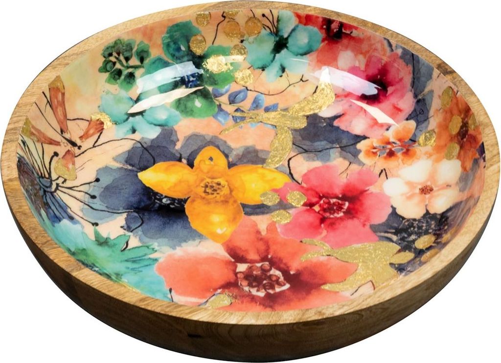 A close-up, overhead view of a decorative bowl with a floral pattern.