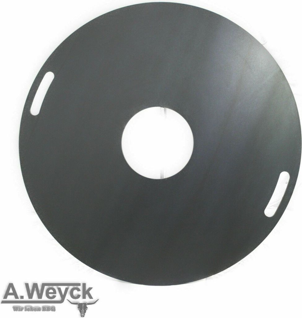 A circular metal grill plate with a hole in the center and two handles on the sides, placed on a white background.