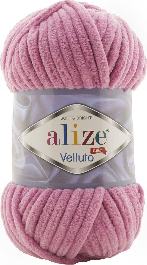 A ball of pink yarn on a white background.