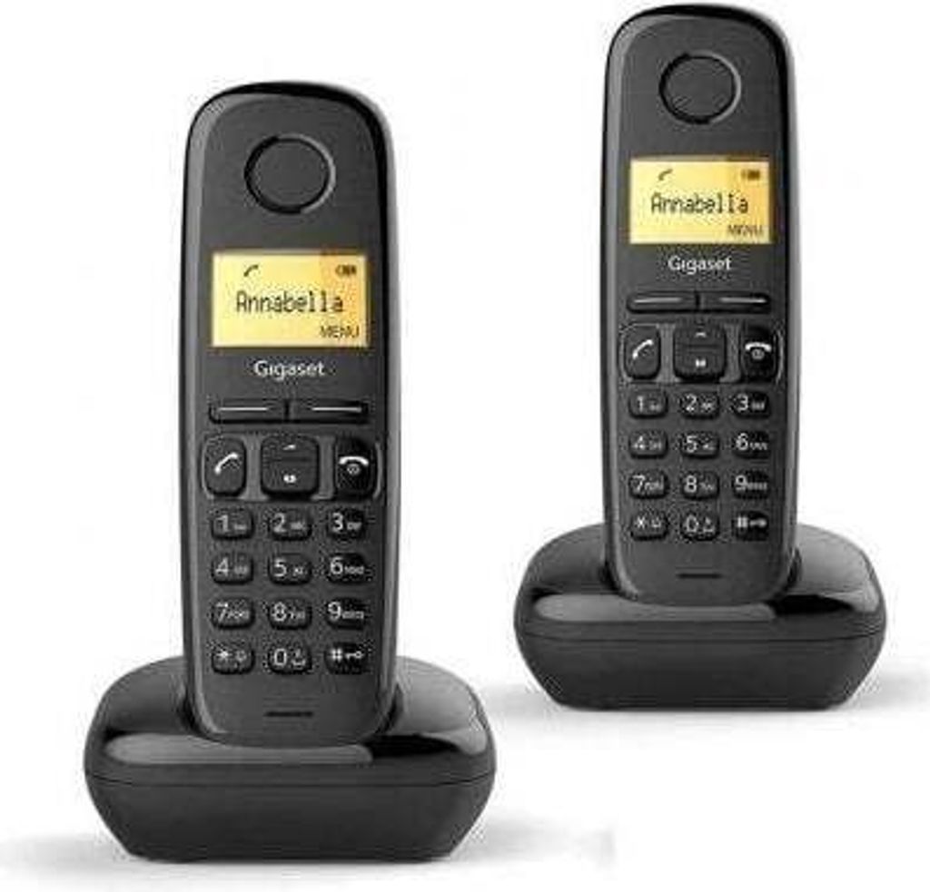 Two black Gigaset cordless phones are shown on their charging bases against a white background.