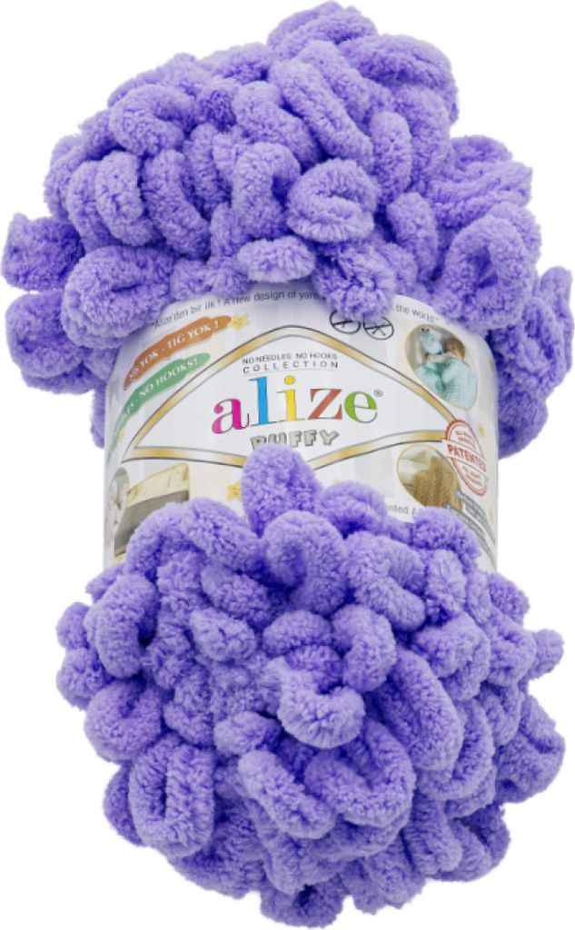 A ball of fluffy purple yarn on a white background.