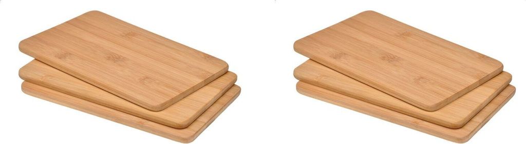 Two stacks of bamboo cutting boards on a white background.