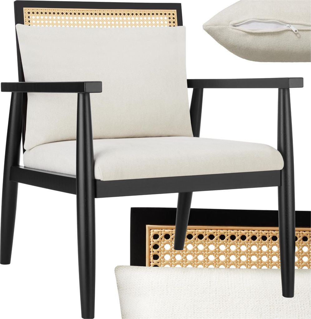 A studio shot of a black armchair with cream upholstery and a cane back, with a separate cream cushion shown in the upper right corner.