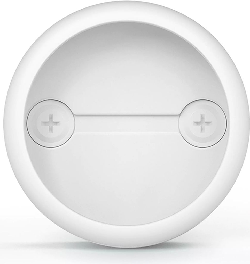 A close-up view of the bottom of a white, circular object with two visible screws.