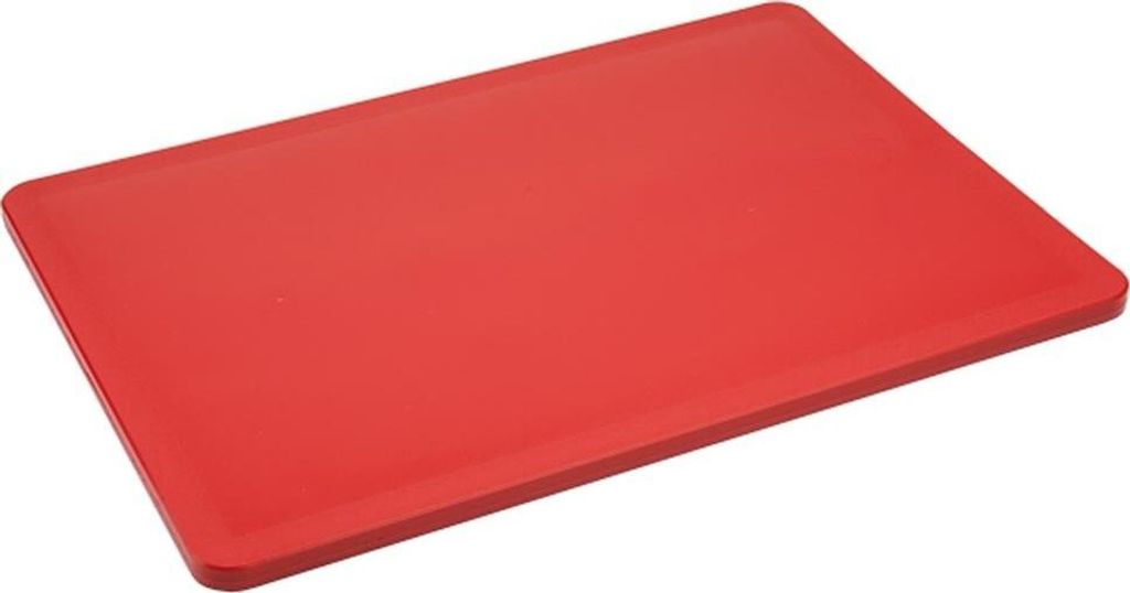 A red plastic cutting board is shown from a diagonal angle against a white background.