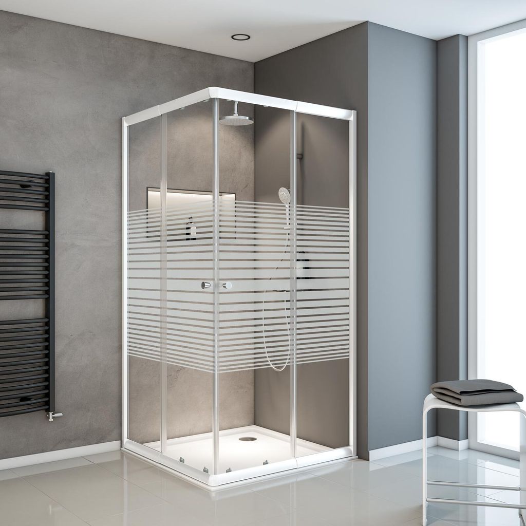 A modern bathroom with a corner shower cabin.