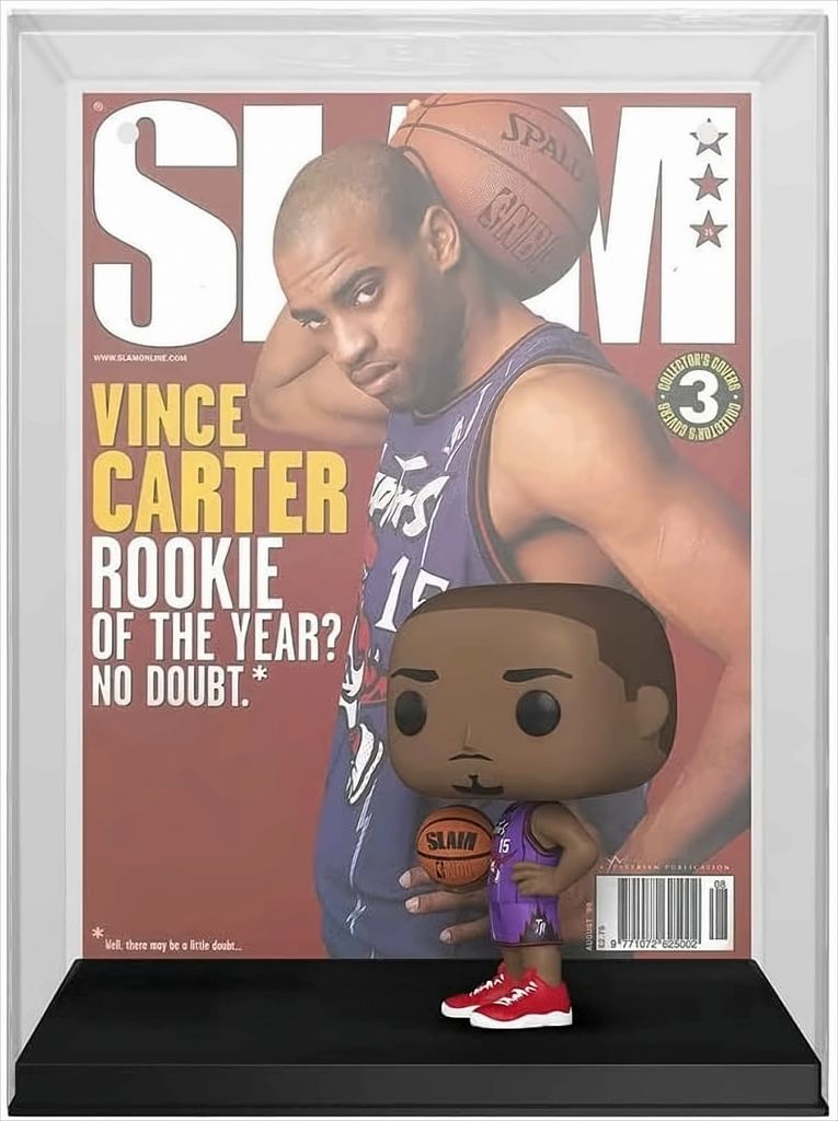 A Funko Pop! figure of Vince Carter holding a basketball in front of a SLAM magazine cover featuring him.