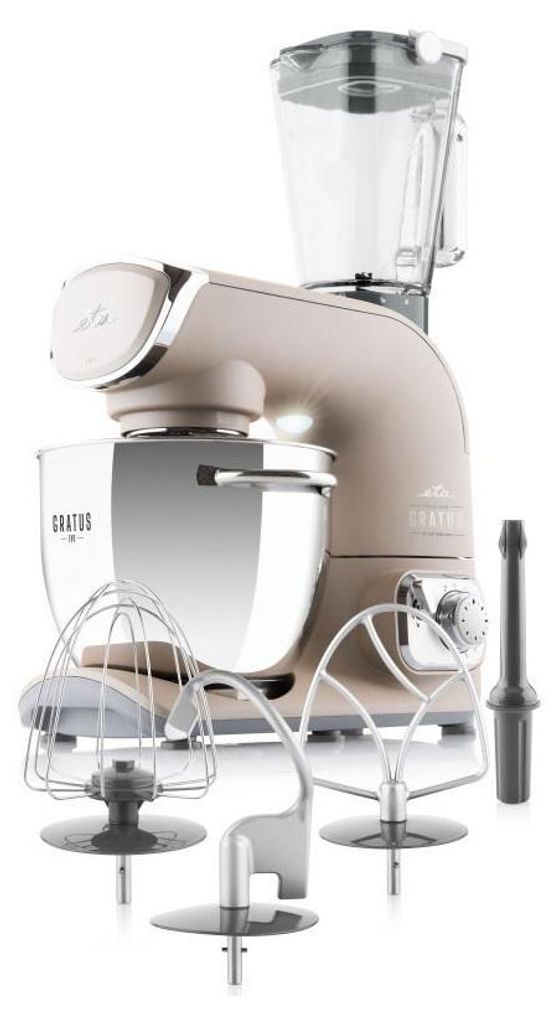 A kitchen mixer with various attachments and a blender jug, displayed on a white background.