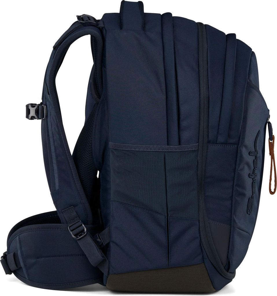 Side view of a dark blue backpack.