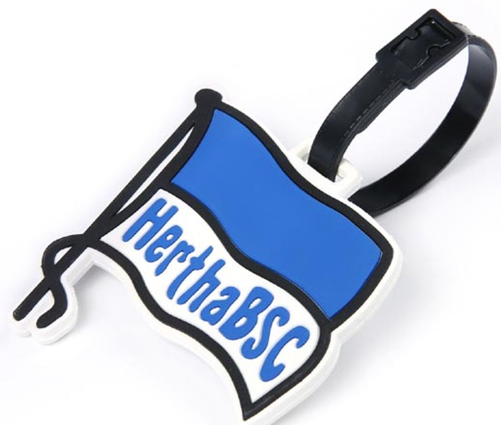 A close-up shot of a Hertha BSC Berlin flag-shaped luggage tag.