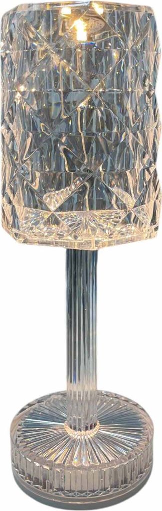 A clear, professional studio shot of a crystal-like table lamp.