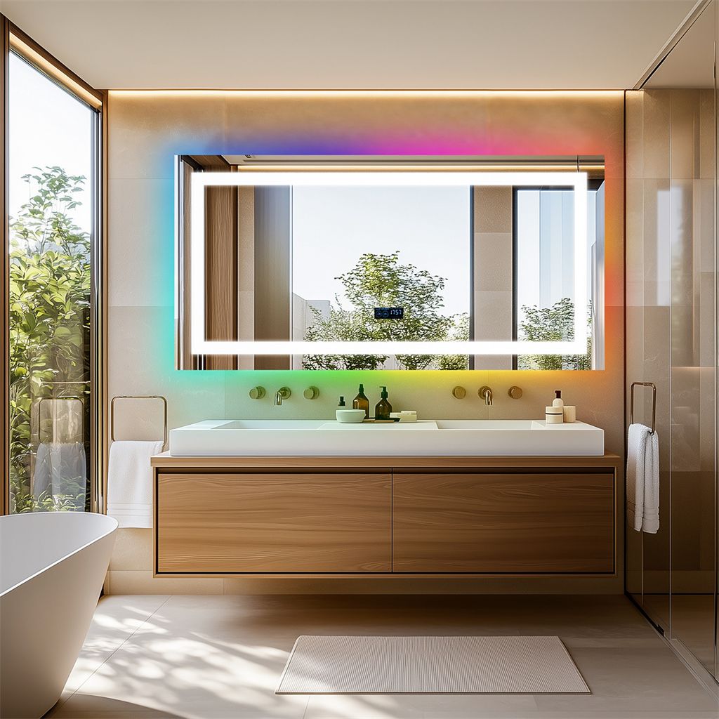 A modern bathroom with a large LED mirror, vanity, and bathtub.