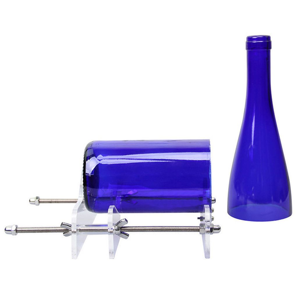 A blue glass bottle and a bottle cutter on a white background.