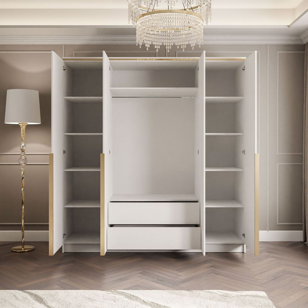 An open wardrobe with shelves and drawers, a floor lamp, and a chandelier in the background.