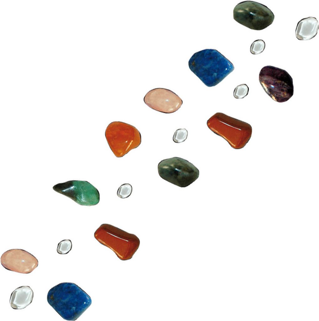 A collection of colorful, polished stones and clear, small glass beads arranged diagonally on a white background.