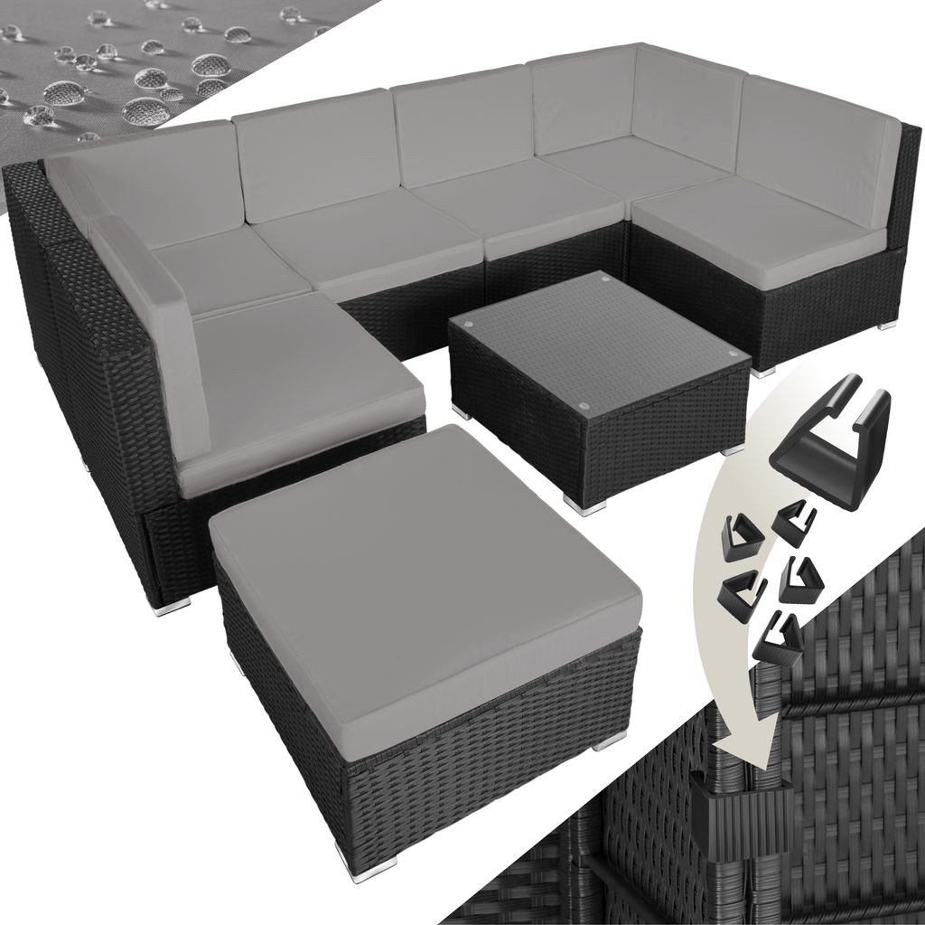 A modular rattan lounge set with grey cushions and a coffee table, along with some connecting clips.