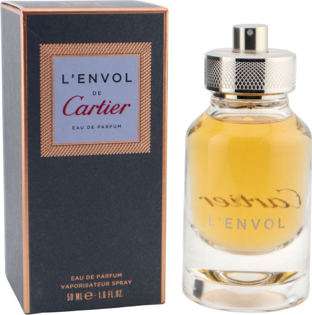 Cartier L’Envol Eau de Parfum, 50ml, mit rundem Glasflakon und goldfarbenem Sprühkopf, neben schwarzer Box mit kupferfarbenem Musterrahmen.