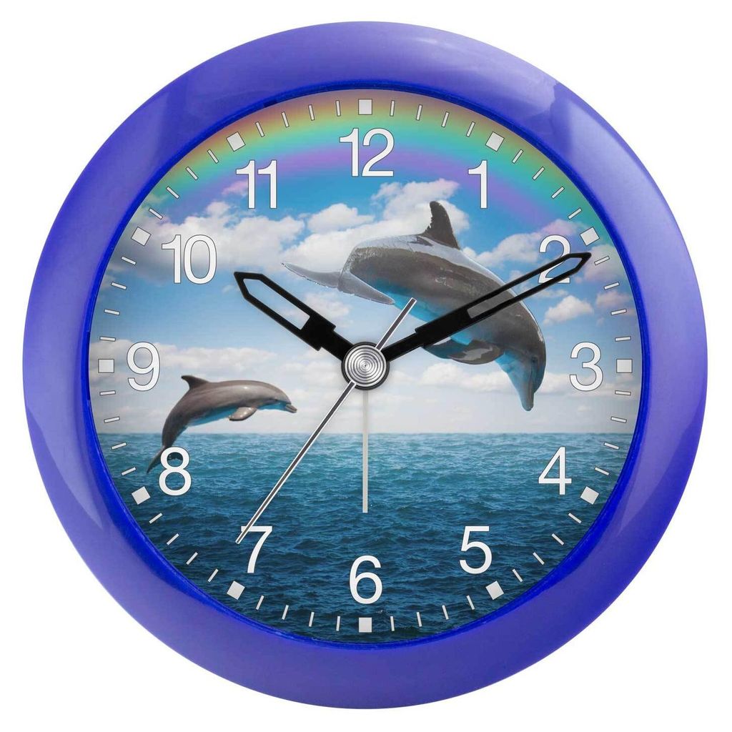 A close-up of a blue alarm clock with a dolphin and rainbow design.