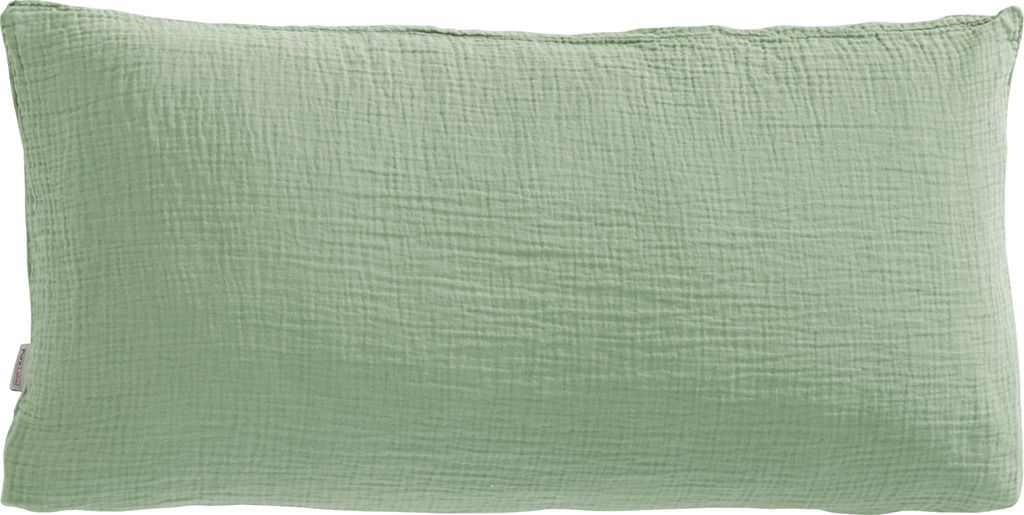 A plain, light green pillowcase made of muslin fabric.
