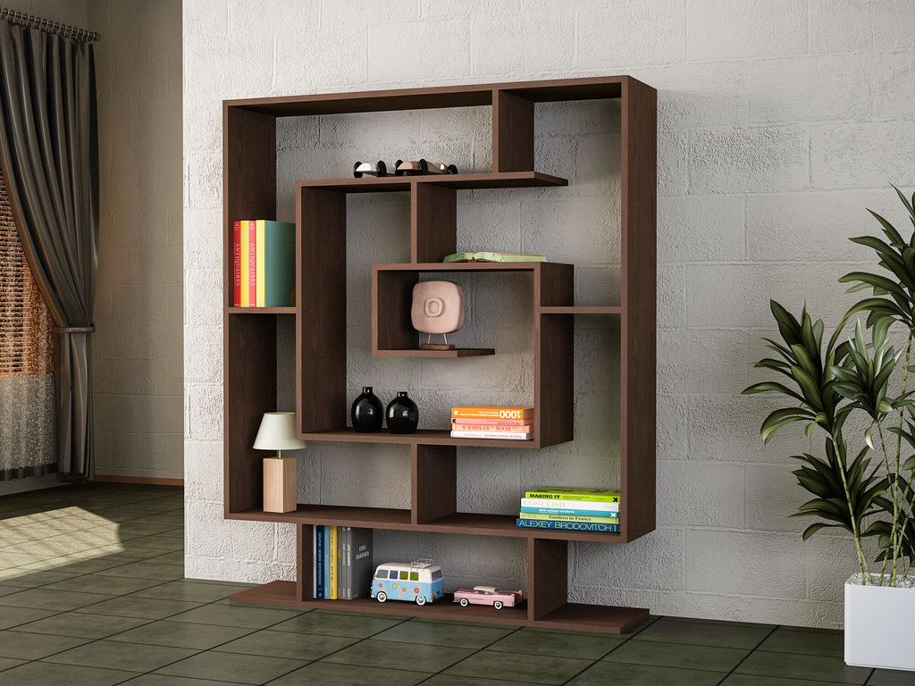 A modern living room with a dark brown bookshelf filled with decorative items and books.