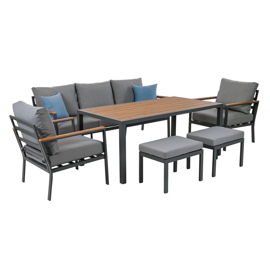 A six-piece outdoor furniture set including a sofa, two chairs, a table, and two ottomans, all with gray cushions and a wooden tabletop.