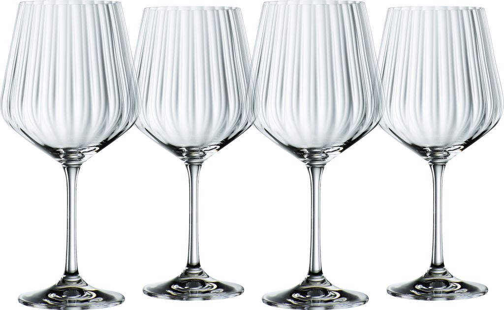 Four clear wine glasses with vertical ribbed texture are arranged in a row against a white background.