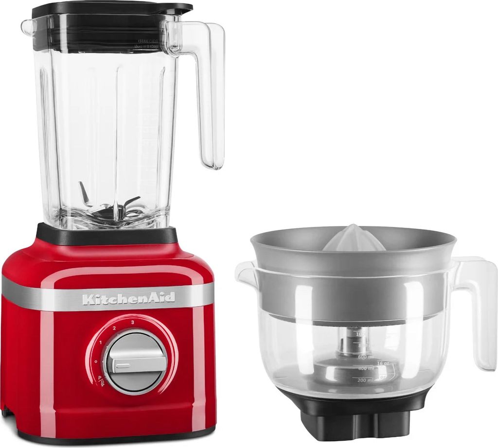 A red KitchenAid blender and a citrus juicer attachment are displayed against a white background.