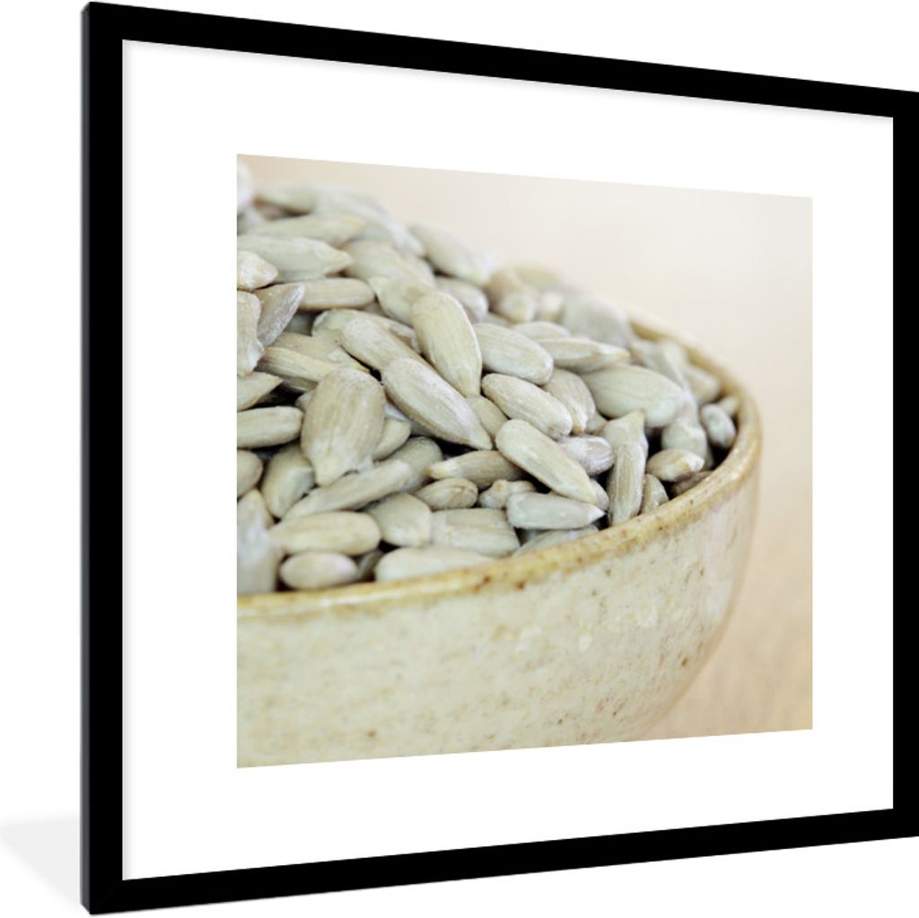 MuchoWow Gerahmtes Poster Schale mit weiß gefärbten Sonnenblumenkernen 40x40 cm - Poster mit Schwarzem Bilderrahmen Wandposter Rahmen Foto Bild...