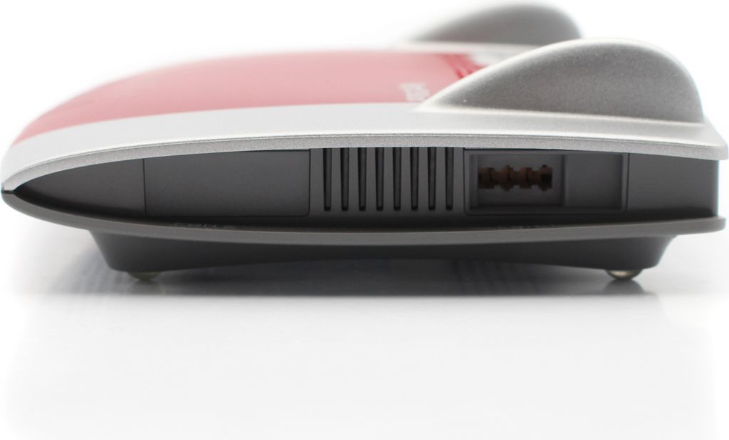A close-up, side view of a router or modem.
