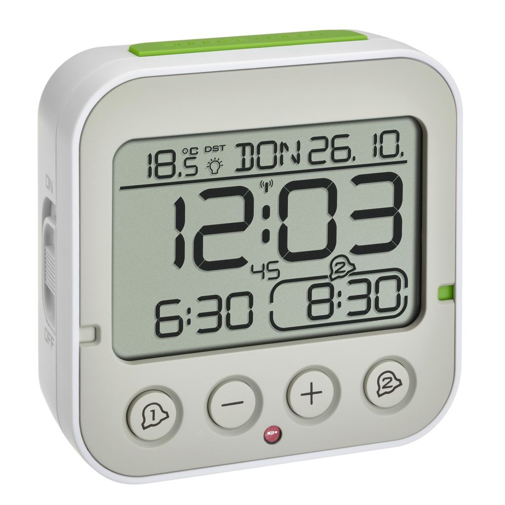 A digital alarm clock is shown against a light gray background.