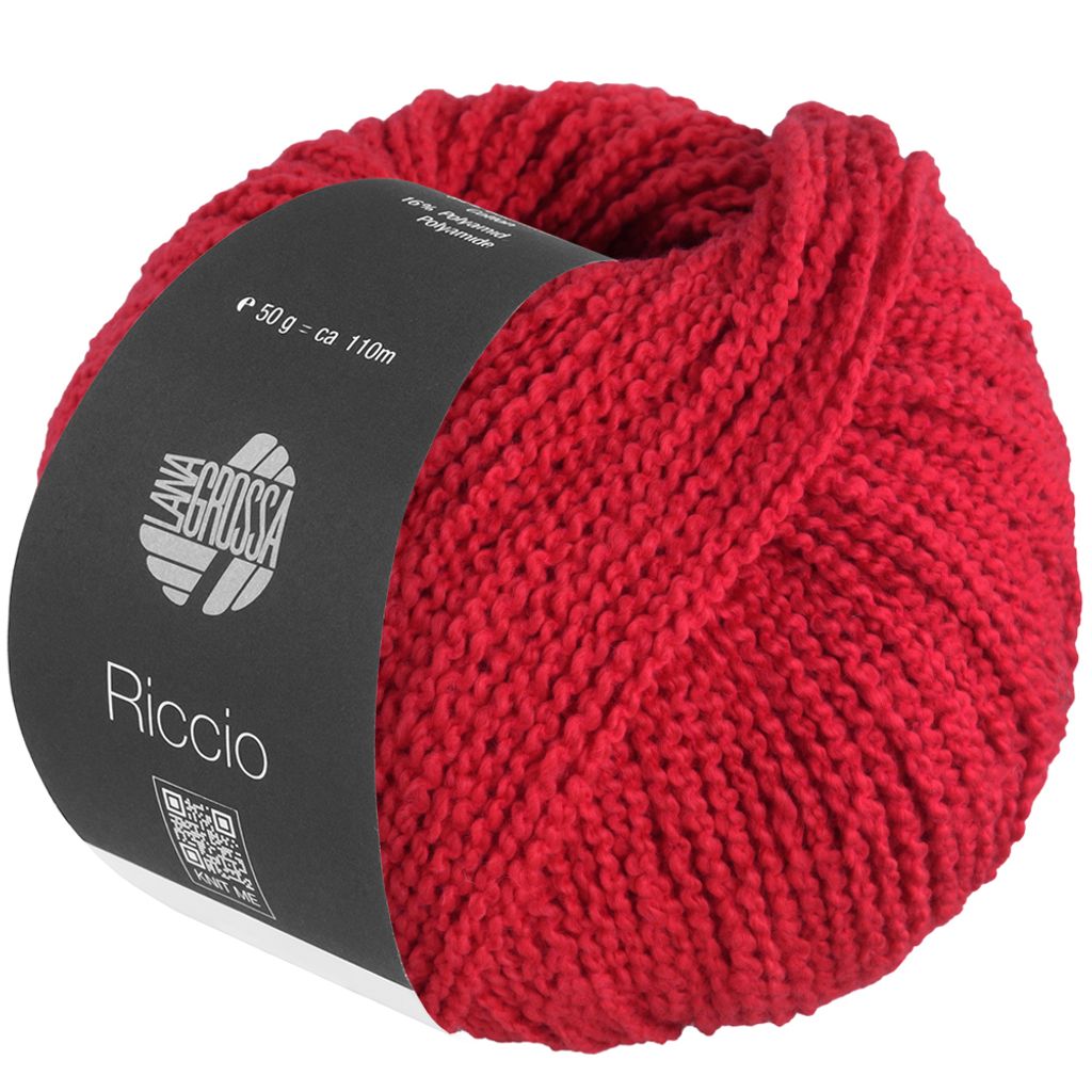 A ball of red yarn with a label wrapped around it.
